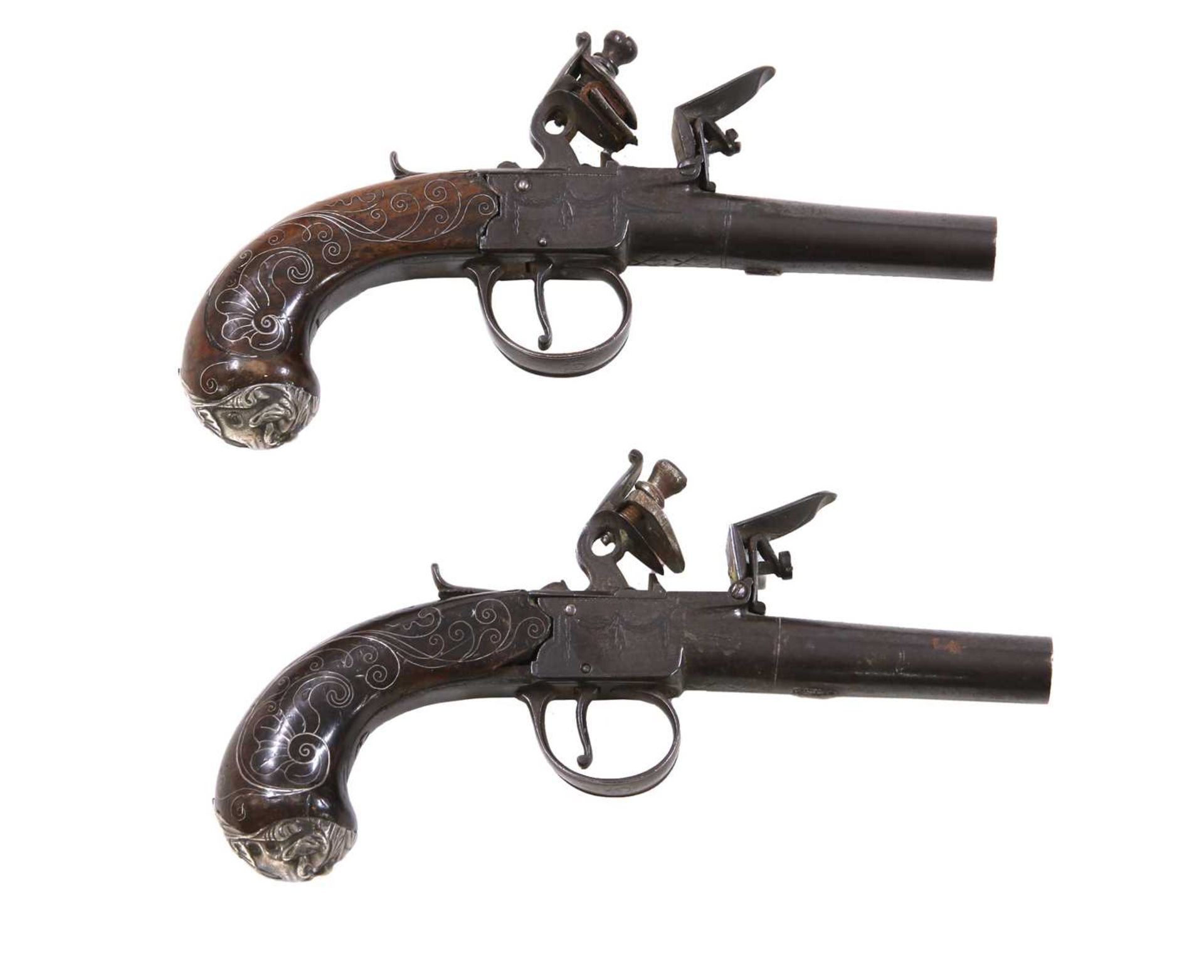 A pair of flintlock travelling pistols by Richard Cowper,