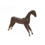 A folk art painted wooden horse,