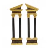 A pair of large carved and giltwood triumphal arch sections,