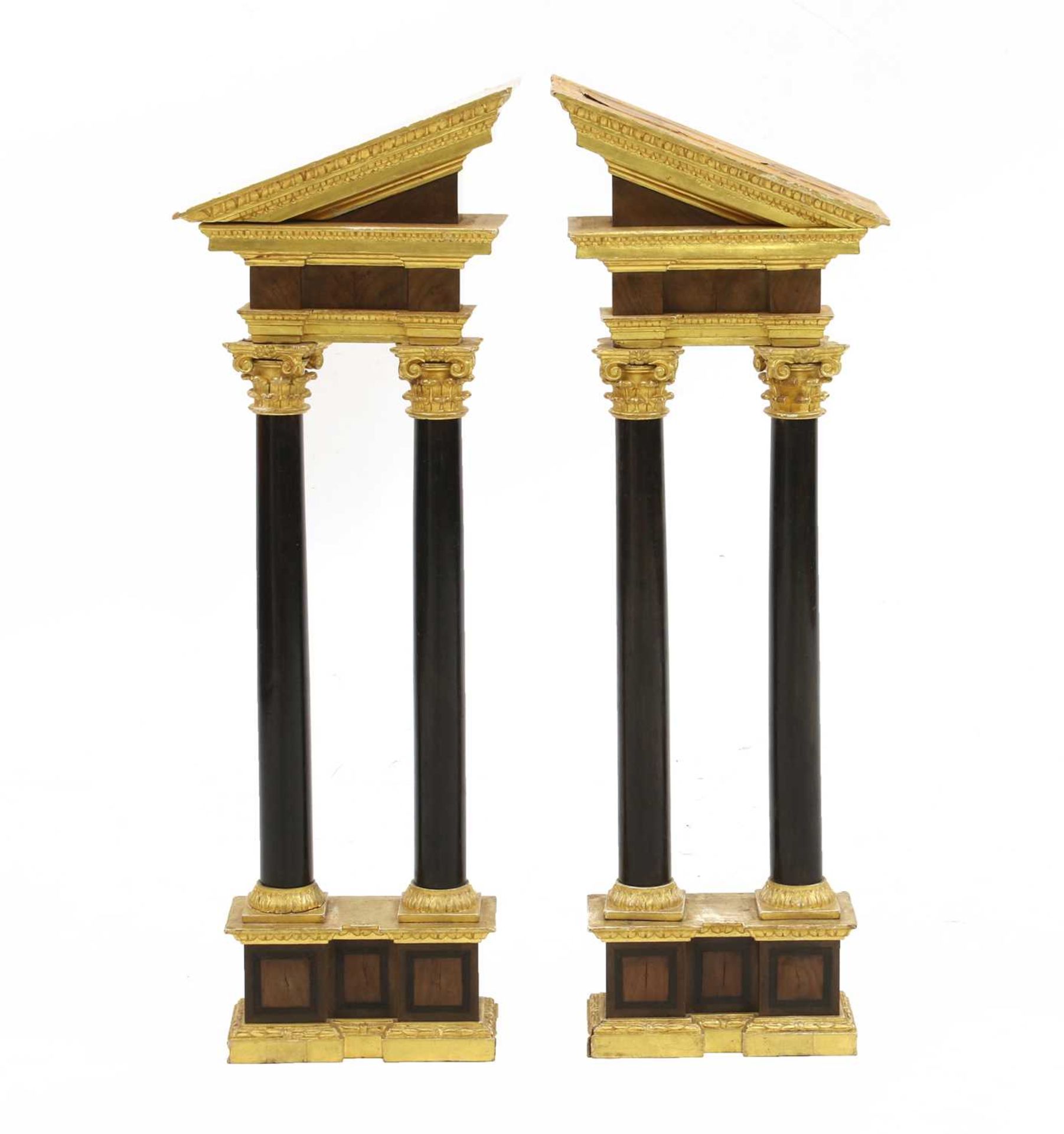 A pair of large carved and giltwood triumphal arch sections,