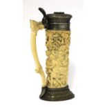 A walrus ivory and pewter-mounted tankard