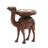 An Indian carved teak occasional table,