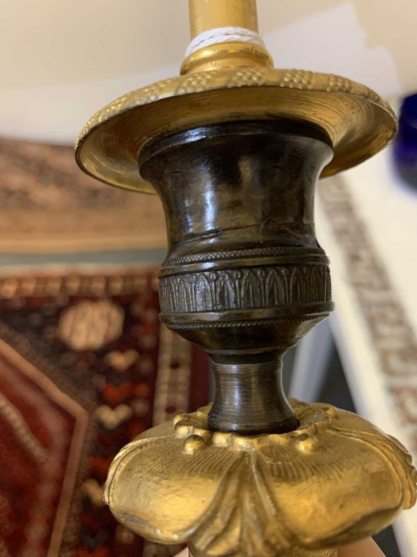 A pair of French Empire-style bronze and gilt-bronze candlesticks, - Image 3 of 19