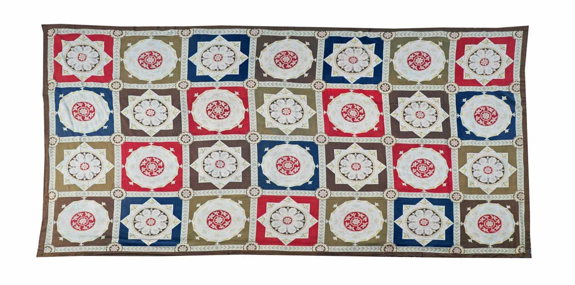 A handwoven needlepoint rug of 17th century Savonnerie design,