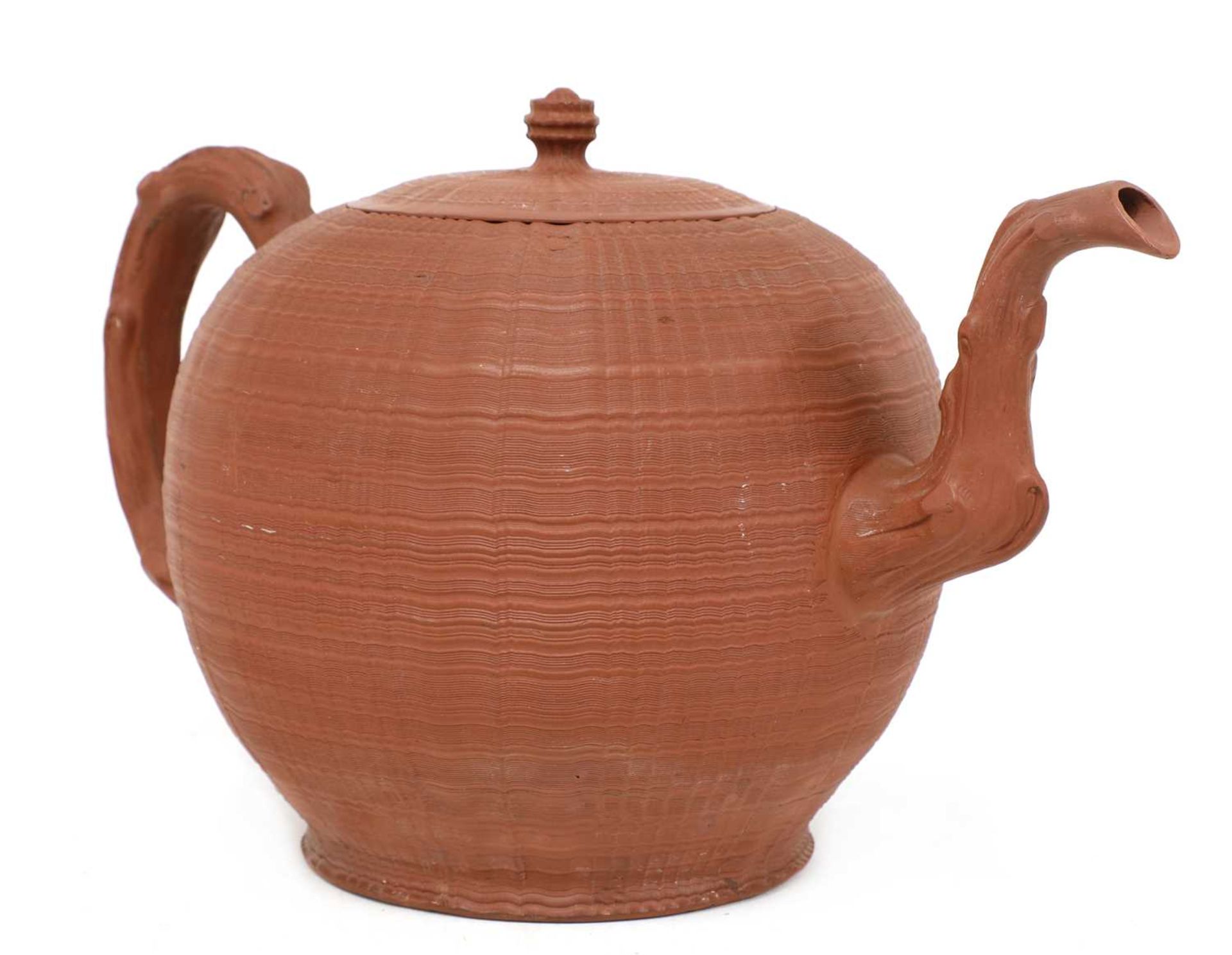 A rare Staffordshire redware globular punch pot and cover,