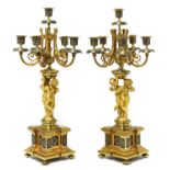 A pair of gilt-bronze and champlevé enamel six-branch candelabra,