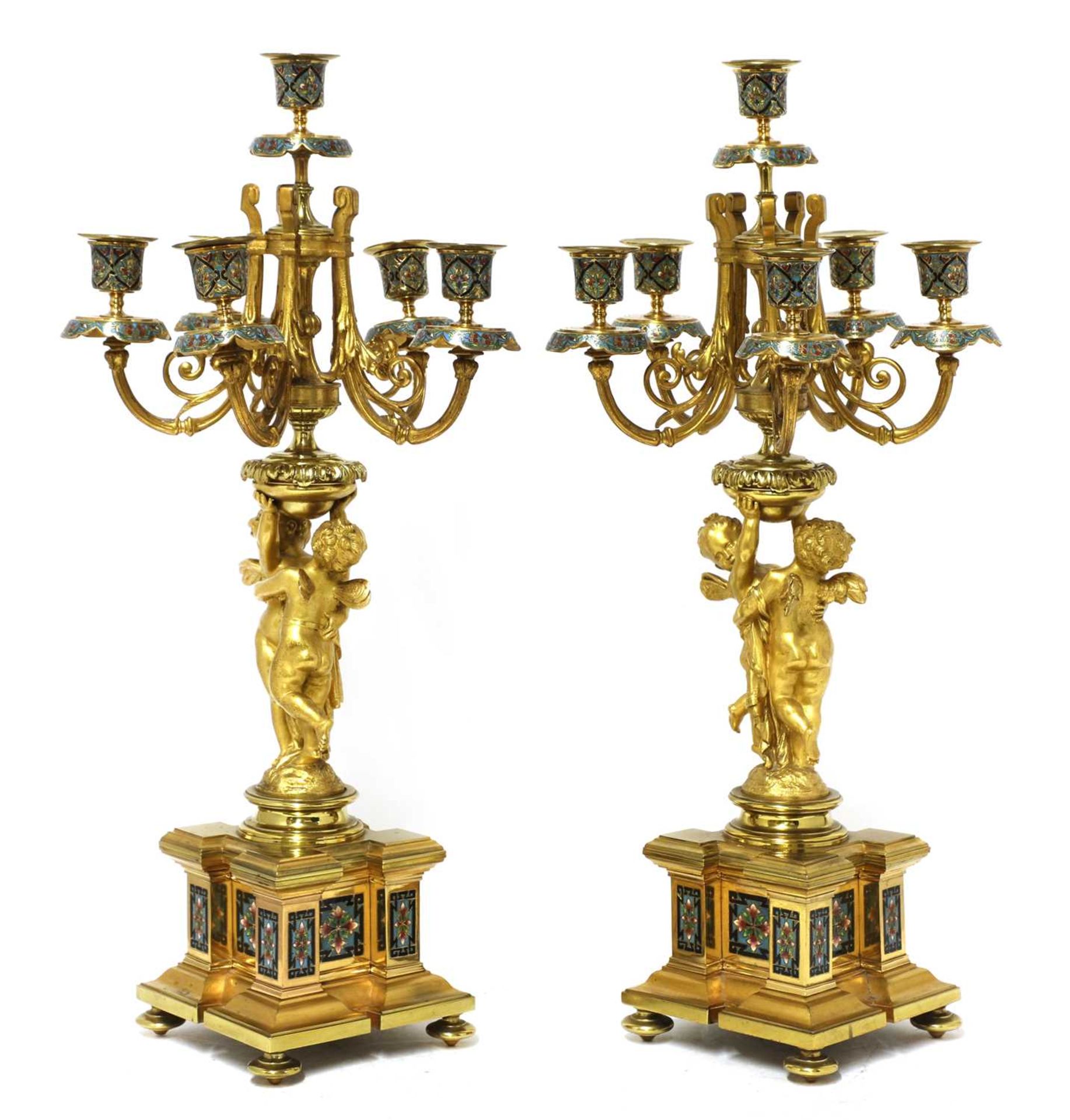 A pair of gilt-bronze and champlevé enamel six-branch candelabra,