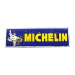 An enamel sign 'Michelin' with illustration,