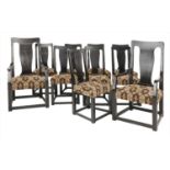 A set of ten ebonised dining chairs,