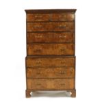 A George III oak and walnut chest on chest,