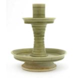 A Chinese celadon candlestick,