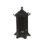 A vintage cast iron ‘Cathedral’ stove,