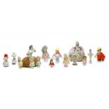 Thirteen various Victorian and Edwardian china pin dolls