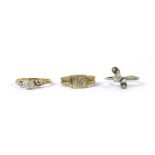 Three gold diamond set rings,