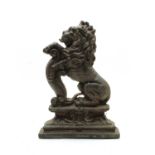 A Victorian cast iron door stop,