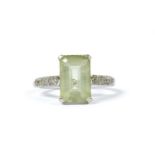 A white gold green beryl and diamond ring,