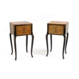 A pair of bedside cabinets