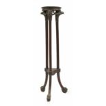 A mahogany torchere,