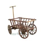 An unusual painted wooden dog cart,