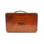 A Vickery crocodile briefcase,