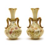 A pair of Royal Worcester blush ivory vases,