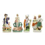 A collection of large Staffordshire figures,