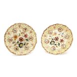 A pair of pierced Zsolnay Pecs plates,