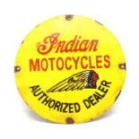 An enamel sign 'Indian Motocycles, Authorised Dealer',
