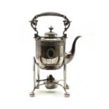 A silver plated kettle on stand and burner,