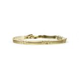 A gold bar link bracelet,