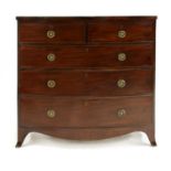 A mahogany bow front chest,