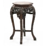 A Chinese carved hardwood and marble topped stand,