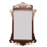 A George II fret carved mahogany wall mirror