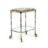 A silver plated two tier trolley,