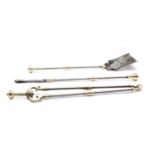 A set of three steel and brass fire tools,