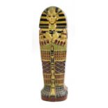 A sarcophagus shaped cabinet,