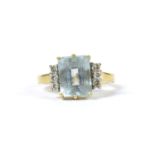 An 18ct aquamarine and diamond ring,