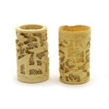 A pair of early 20th century Japanese ivory cylindrical brush holders,