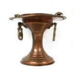 An Arts and Crafts copper font,
