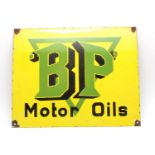An enamel sign 'BP Motor Oils',