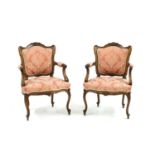 Pair of French walnut fauteuils,