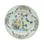 An 18th century Lambeth Delft tin glazed charger,