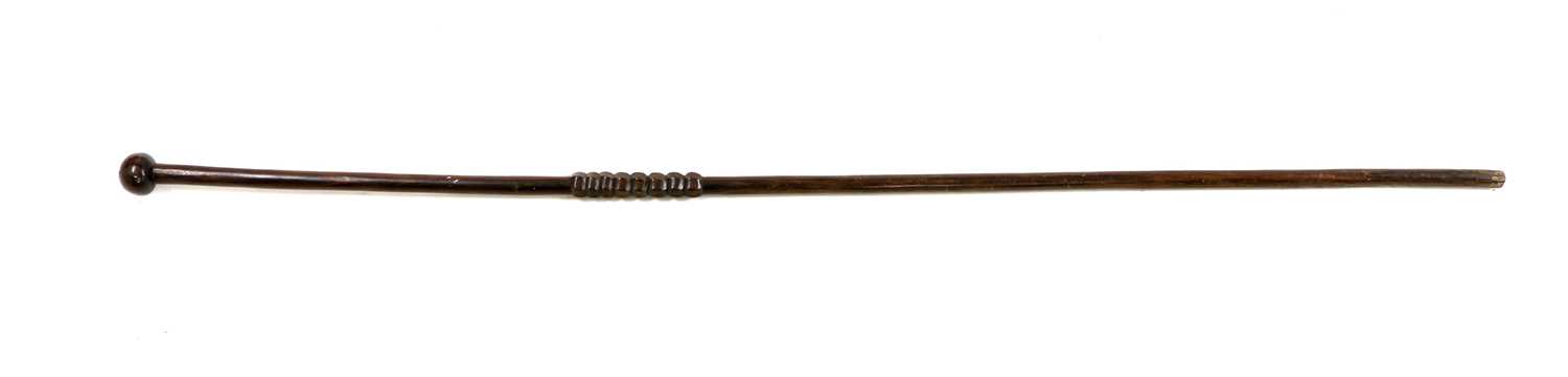 An African turned hardwood walking stick