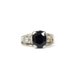 A white gold sapphire and diamond ring,