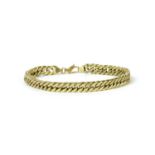 A gold double hollow curb link bracelet,