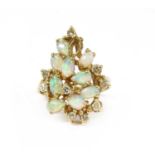 A gold opal and diamond cluster ring,