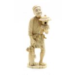 A 19th century Japanese carved sectional ivory figure of a gardener