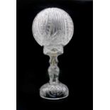 An Art Deco cut glass lamp with cut glass globe