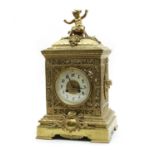 A French brass mantel clock,