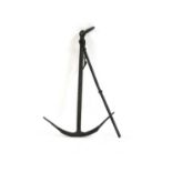 A cast iron anchor with black painted finish,